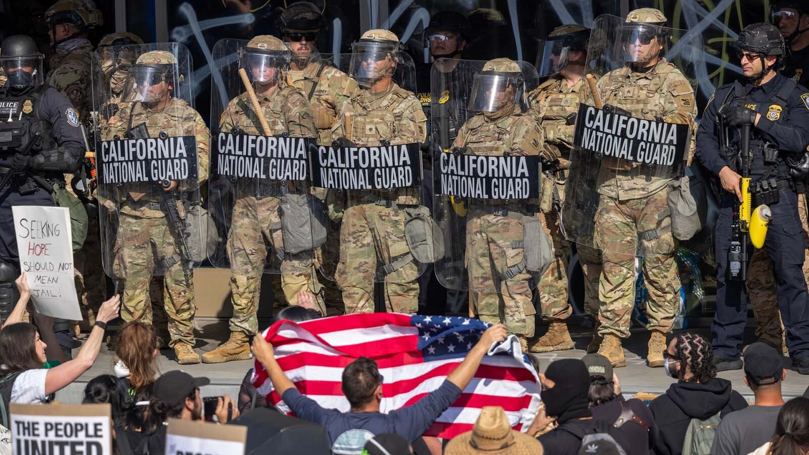 The California National Guard stands in formation in Los Angeles in response to ongoing immigration riots. Gov. Mark Gordon says he doesn't expect a similar resposne will be necessary at Wyoming protests.